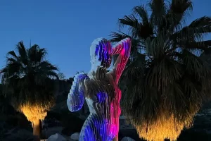 Lighted Statue in landscaped yard